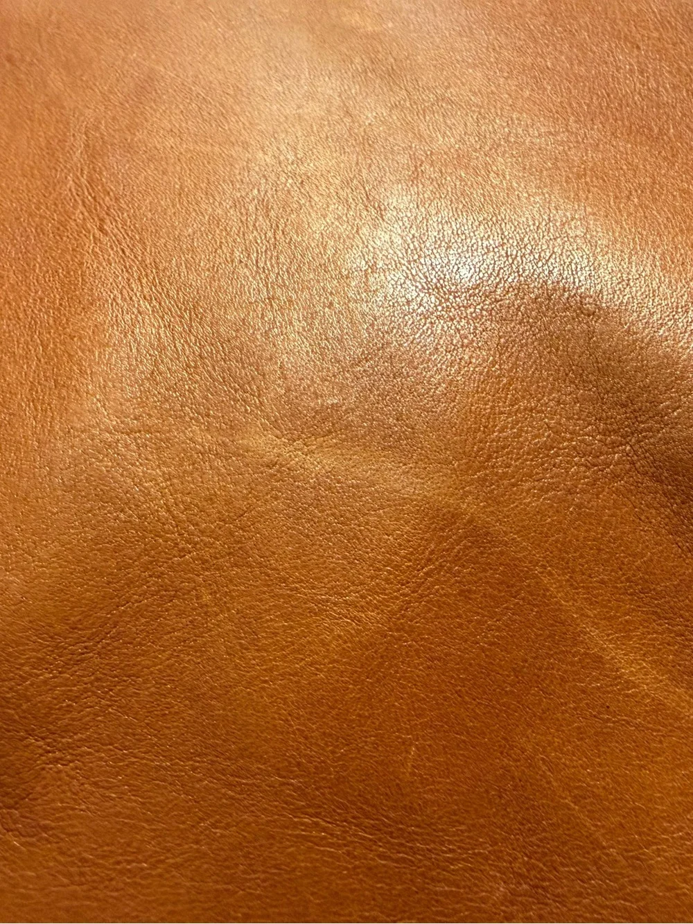 Patricia Nash brown/cognac tote with geometric laser cut pattern.